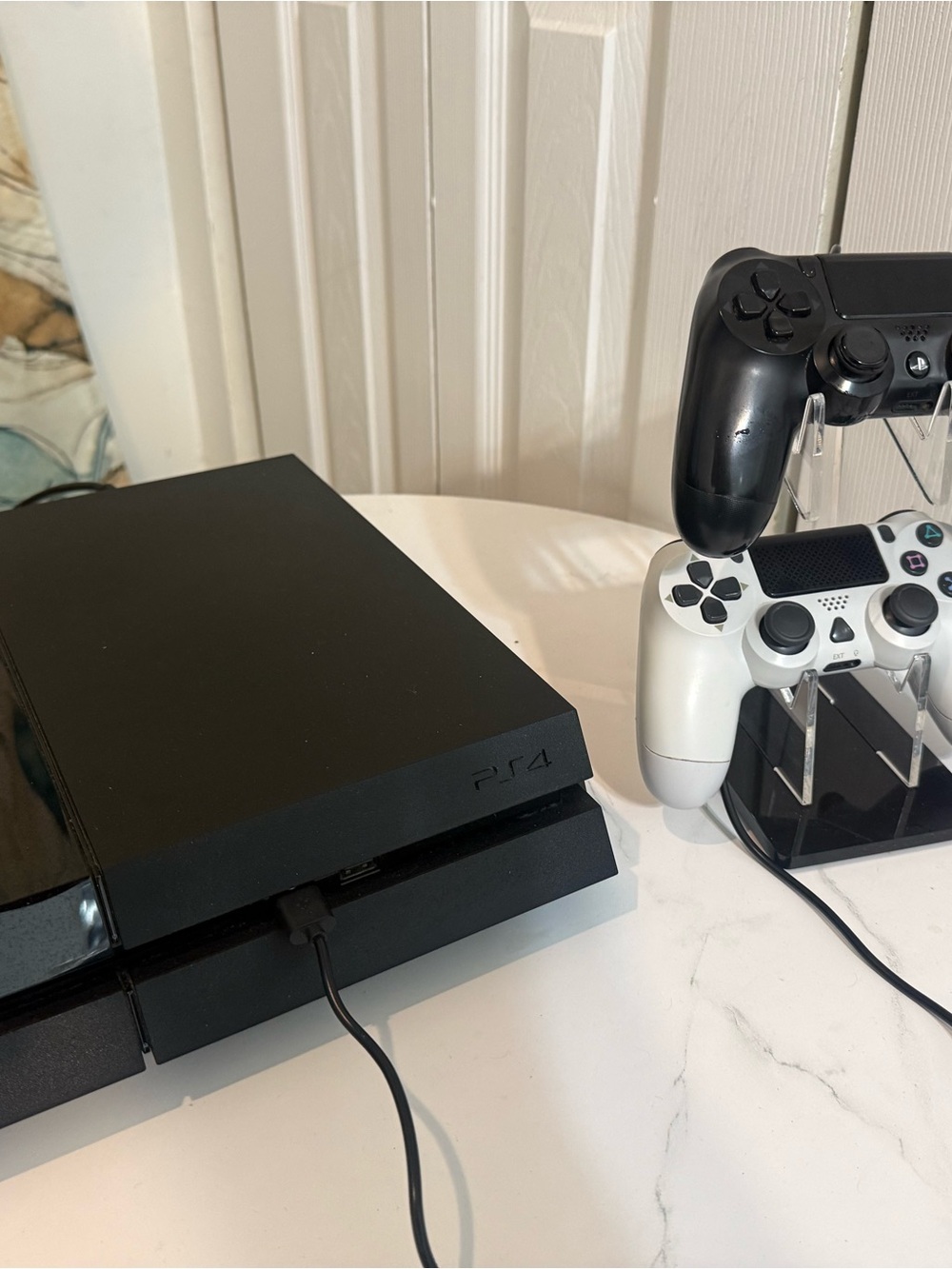 Sony PS4 Console with Black and White DualShock Controllers